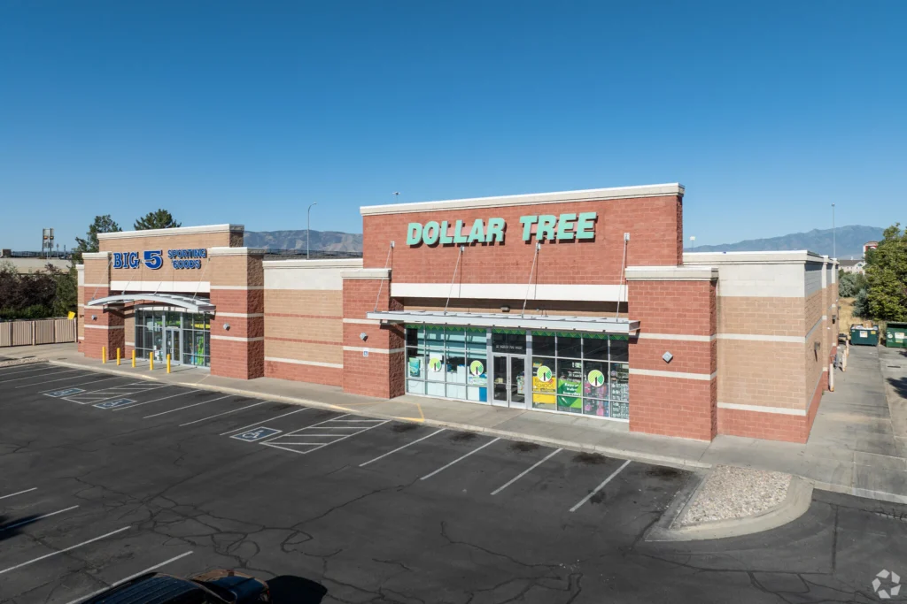 Dollar Tree and Big 5 storefronts with adjacent parking at Alpine Valley Shopping Center in American Fork, Utah.